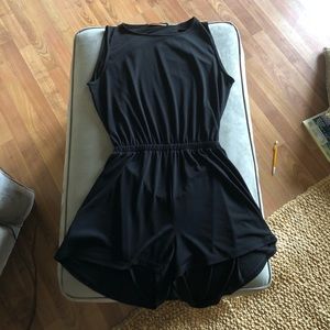 Unique black backless and sleeveless romper